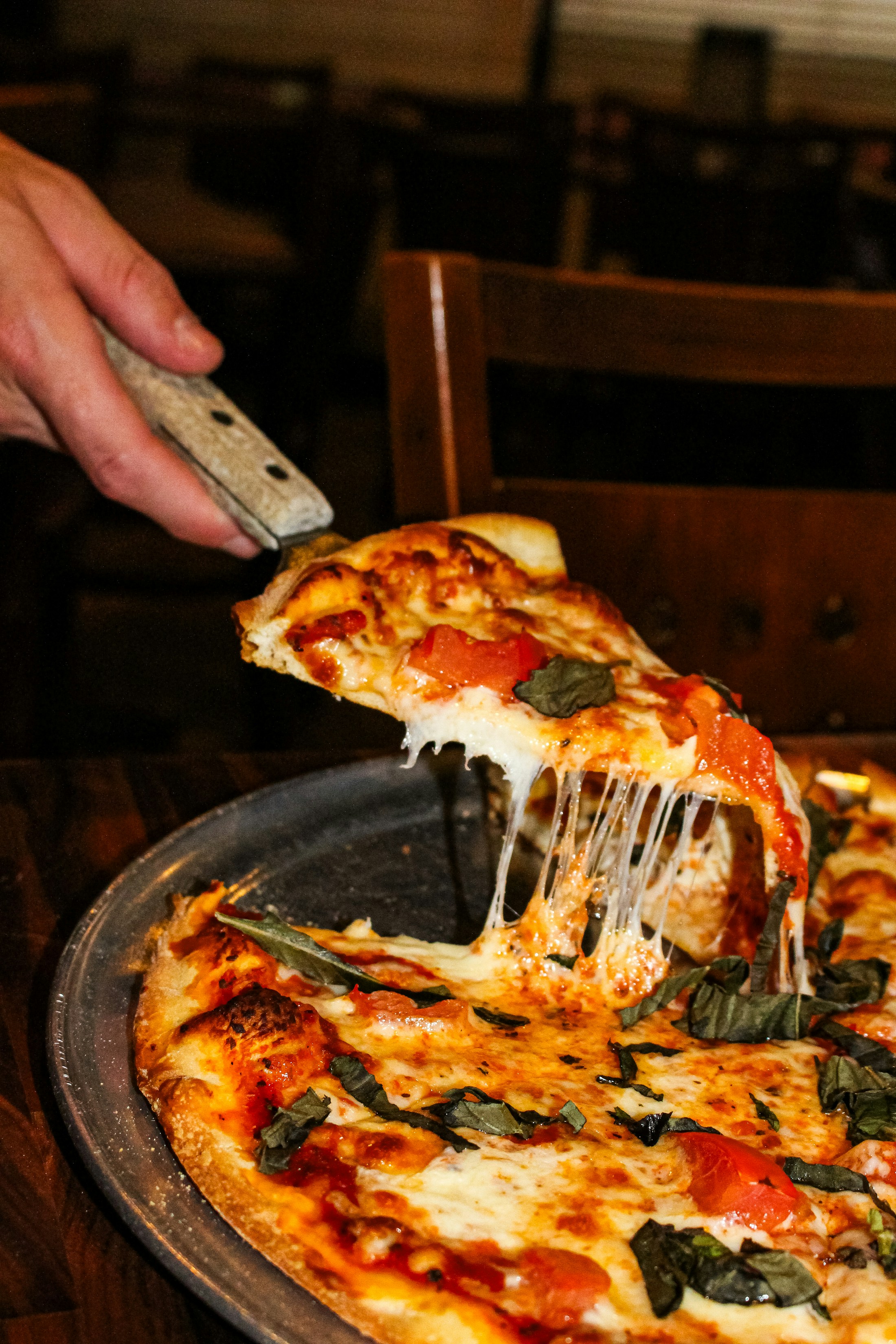 Queijo derretendo em pizza real